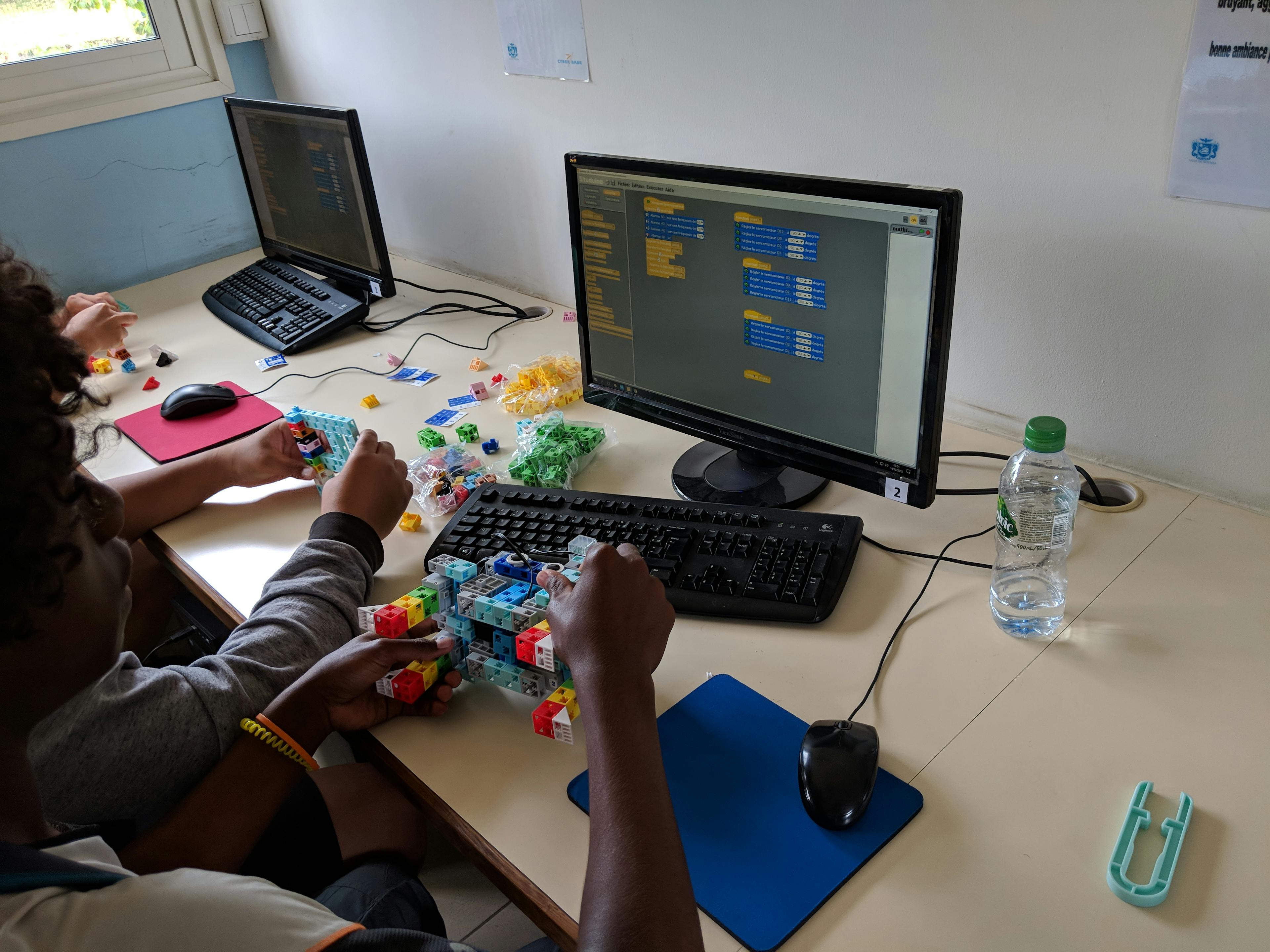 students programming a robot
